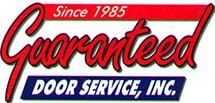 Guaranteed Door Service, Inc. logo with red, white, and blue text and “Since 1985” banner