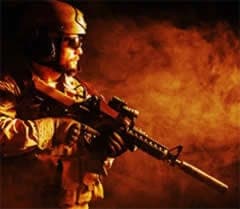 A military troop holding a weapon