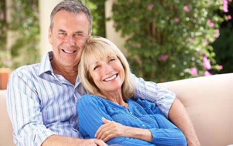 Teeth Cleanings — Senior Couple Smiling in Erie, PA Teeth Cleanings — Senior Couple Smiling in Erie, PA
