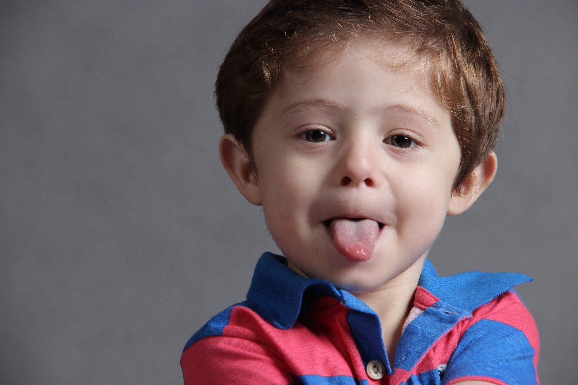 young-boy-with-tongue-out