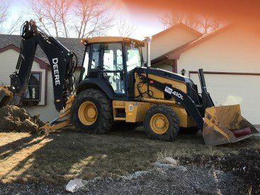 Excavator on Work — Excavation in Laporte, CO Excavator on Work — Excavation in Laporte, CO
