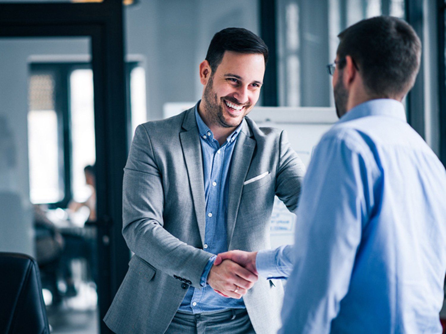 Insurance Agent Hand Shaking With Client — Alexandria, LA — Best & Swains Insurance Agency Insurance Agent Hand Shaking With Client — Alexandria, LA — Best & Swains Insurance Agency