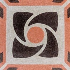 una piastrella di color arancione, marrone e bianco