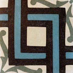 una piastrella di color bianco,grigio e azzurro