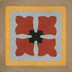 una piastrella a disegni di fiori di color rosso