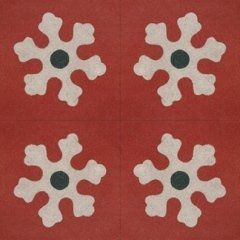 delle piastrelle di color rosso con dei disegni di fiocchi di neve di color bianco