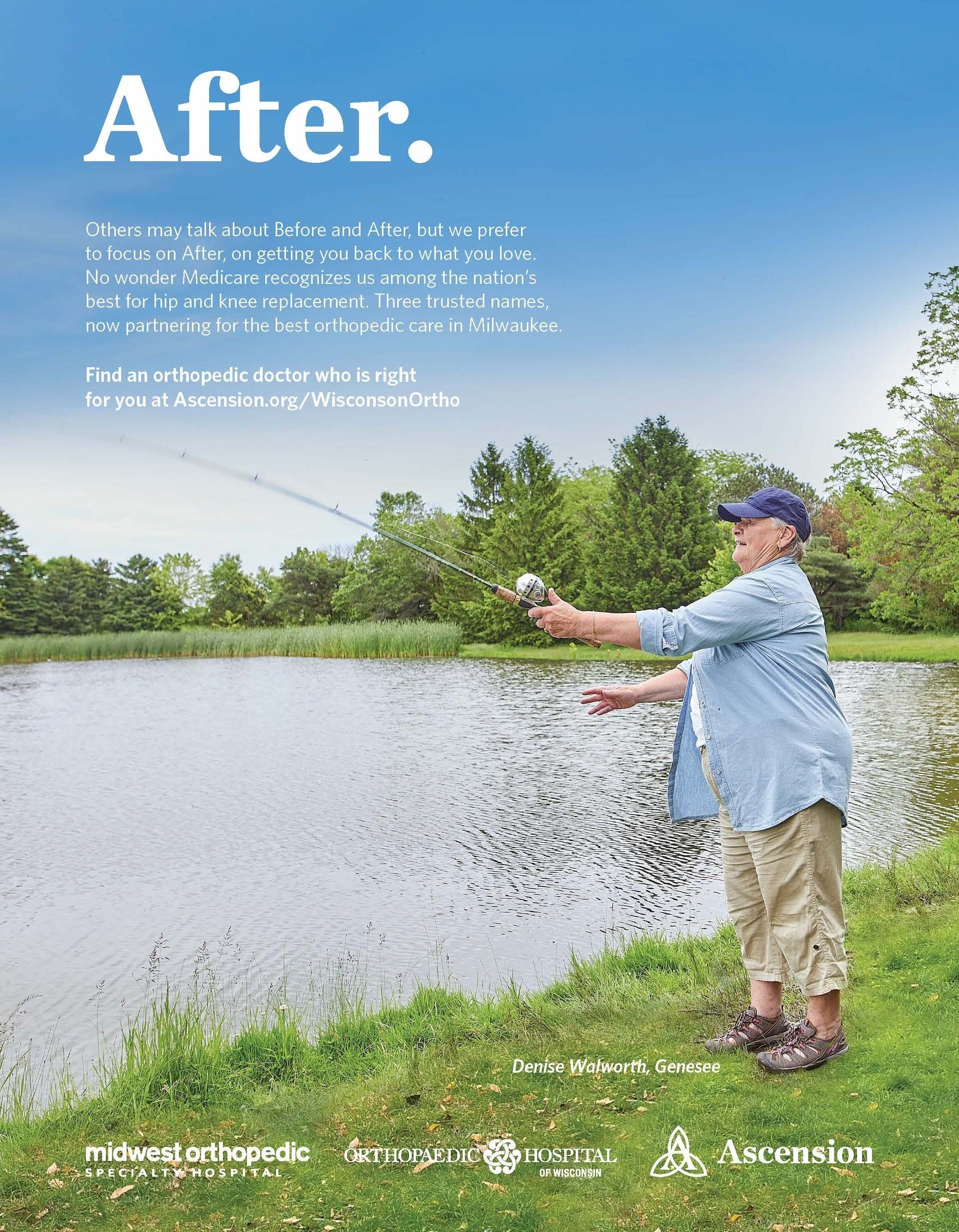 A man is fishing in a lake with a fishing rod.