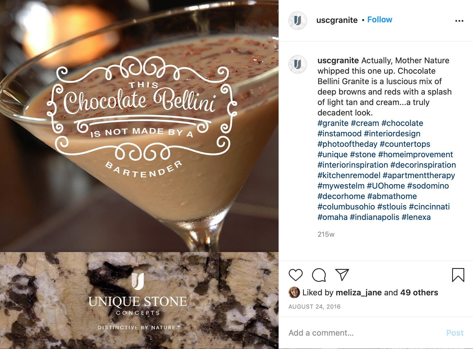 A close up of a chocolate martini in a glass on a table.