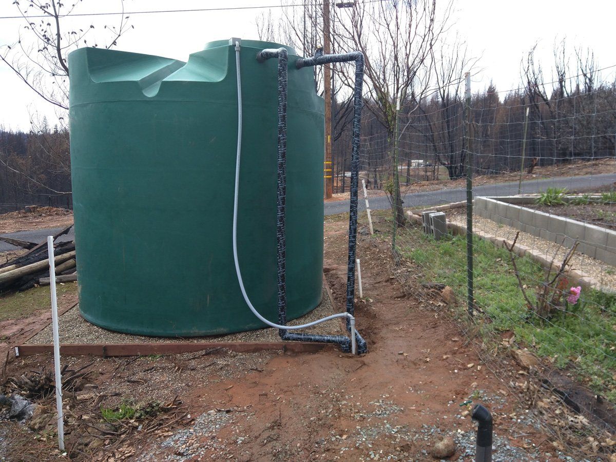 Well Pump — Green Water Tank in Pine Grove, CA Well Pump — Green Water Tank in Pine Grove, CA