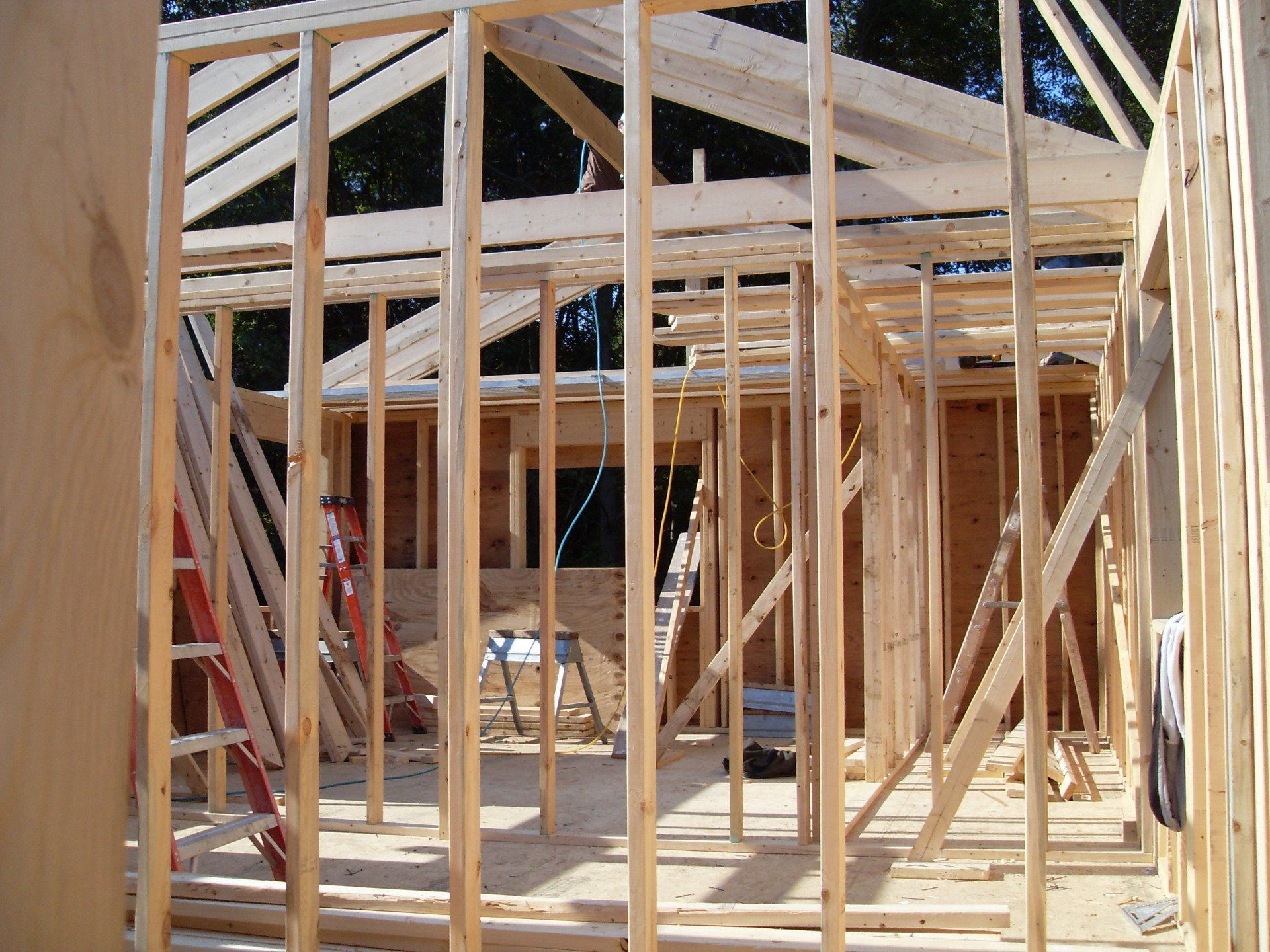 A wooden frame of a house under construction
