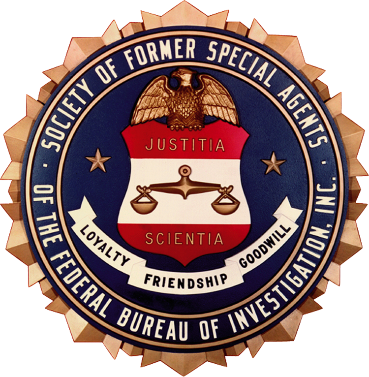 Emblem of the Society of Former Special Agents of the FBI. Gold, blue, and red seal with eagle, scales, and text.