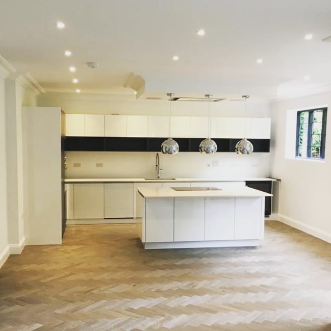 kitchen design with wooden flooring and wardrobe design