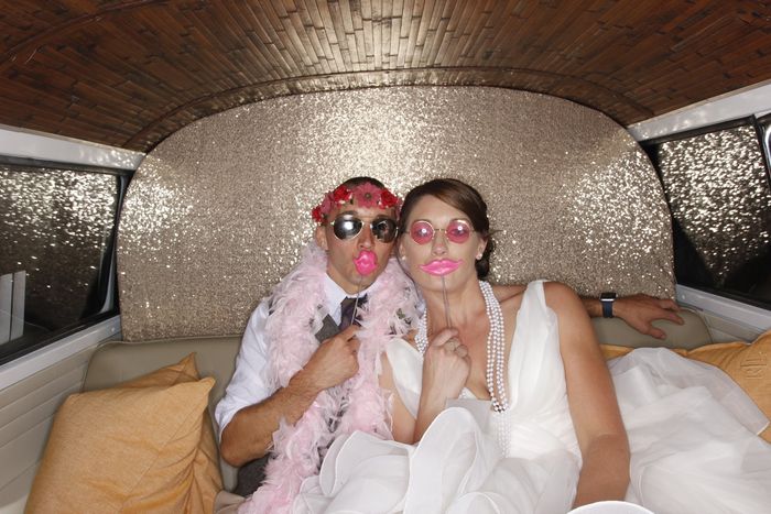 Bride and groom taking photos inside SunKissed Photo Bus, Chattanooga's Photo Booth Rentals