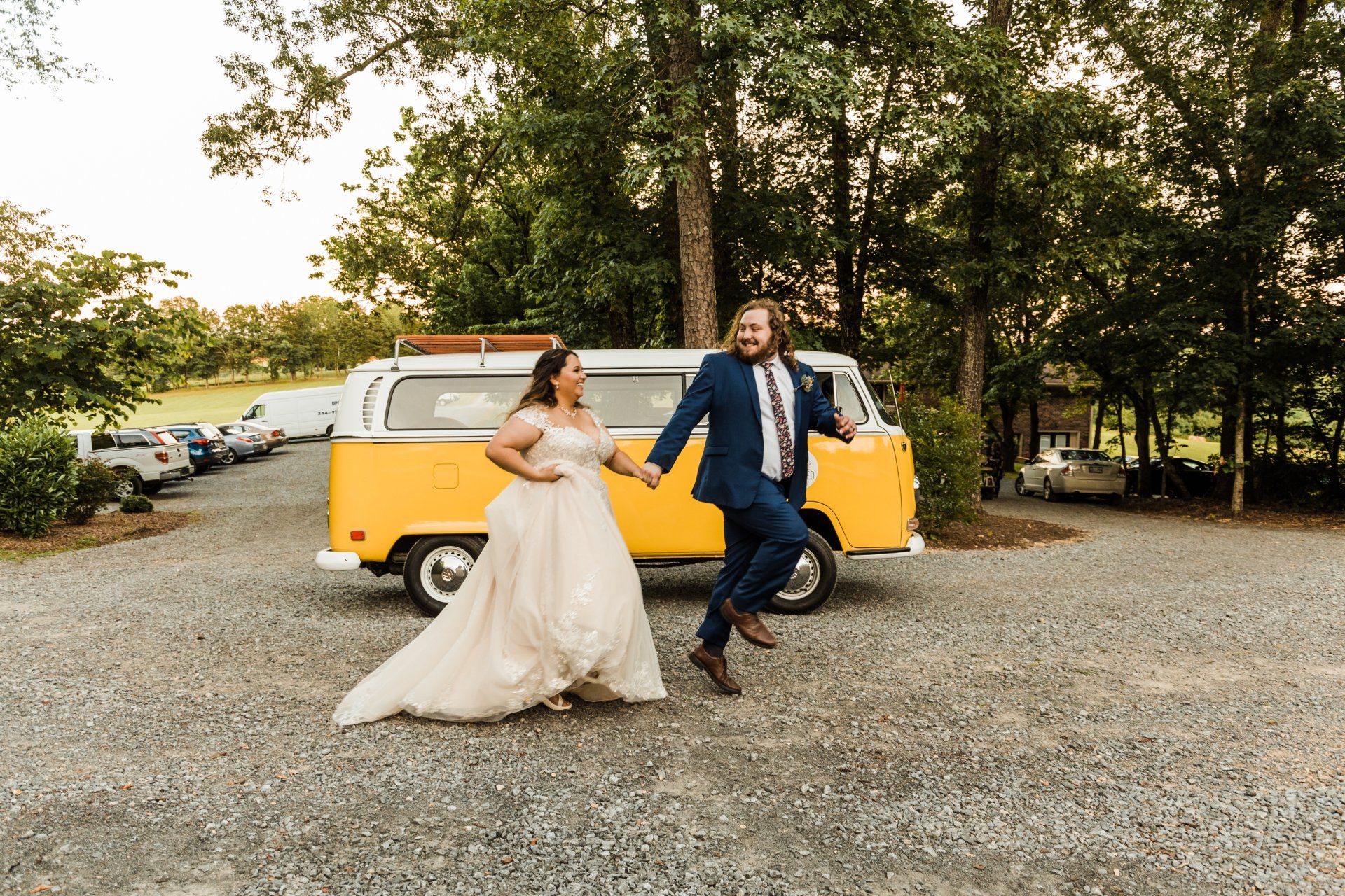 Wedding getaway car with a yellow VW bus