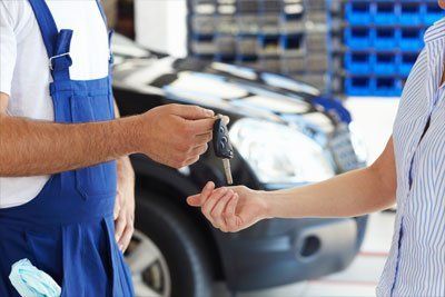 Professional handing the car keys