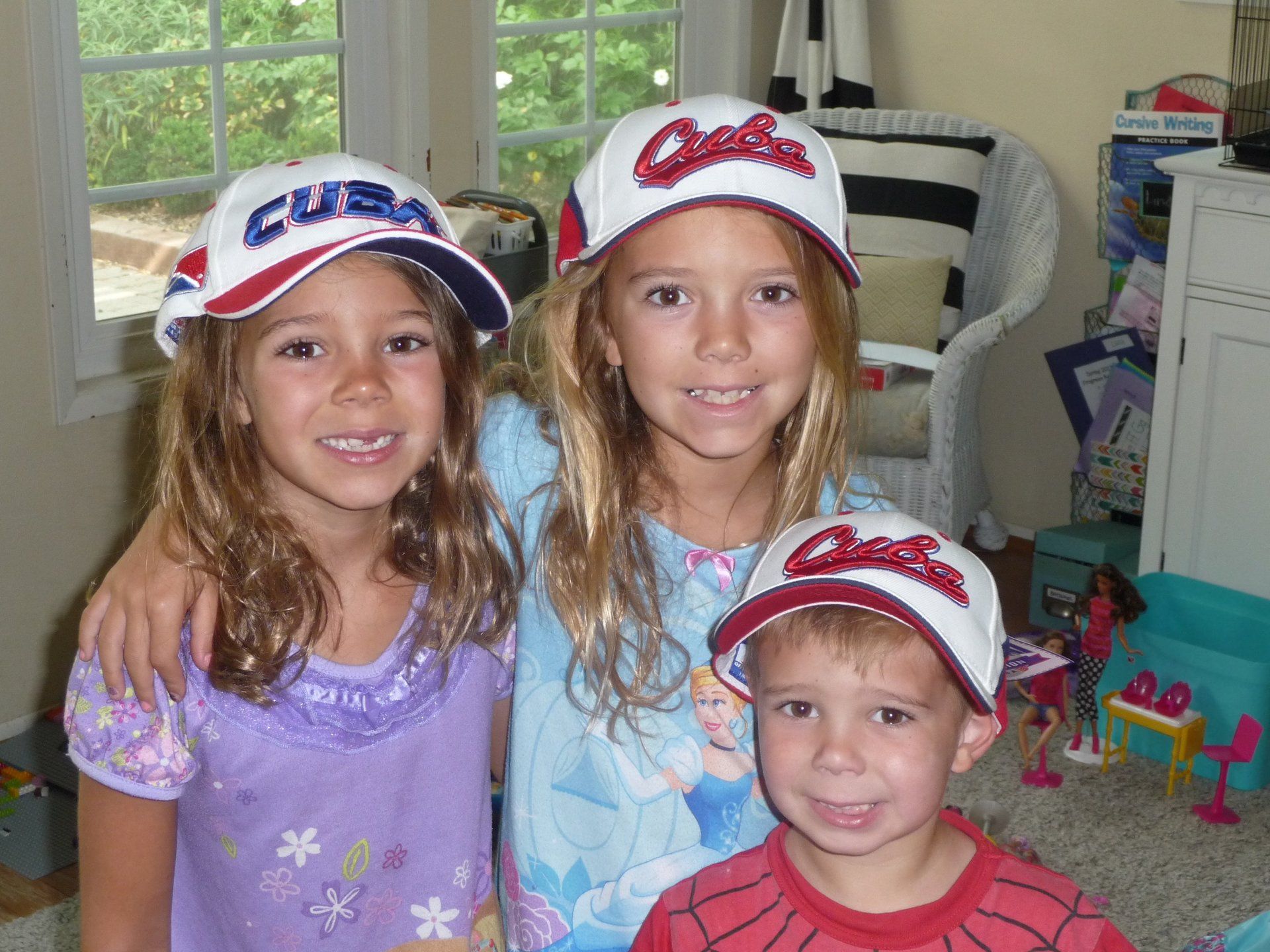 kids with cuban hats