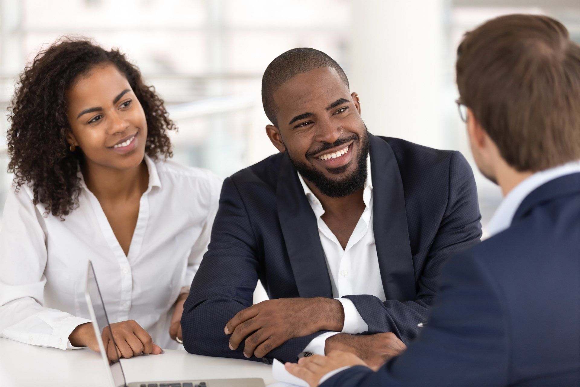 Couple Talking To Financial Advisor — Bradenton, FL — Peninsula Asset Management