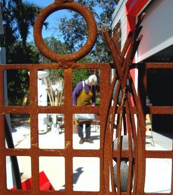 David Wilson, Artist viewed through Lage Metal Sculpture