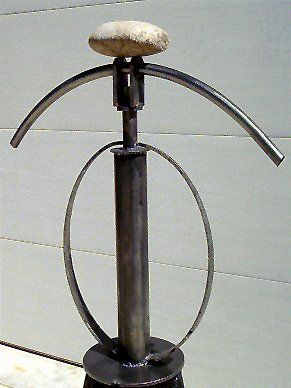 Scrap Metal Sculpture with single stone