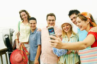 Group of Travelers Taking Picture — Travel Agency in Denver, CO