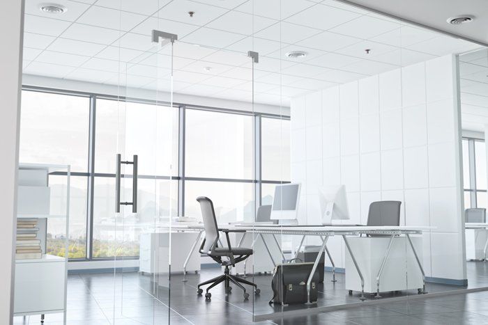Modern office room with glass walls