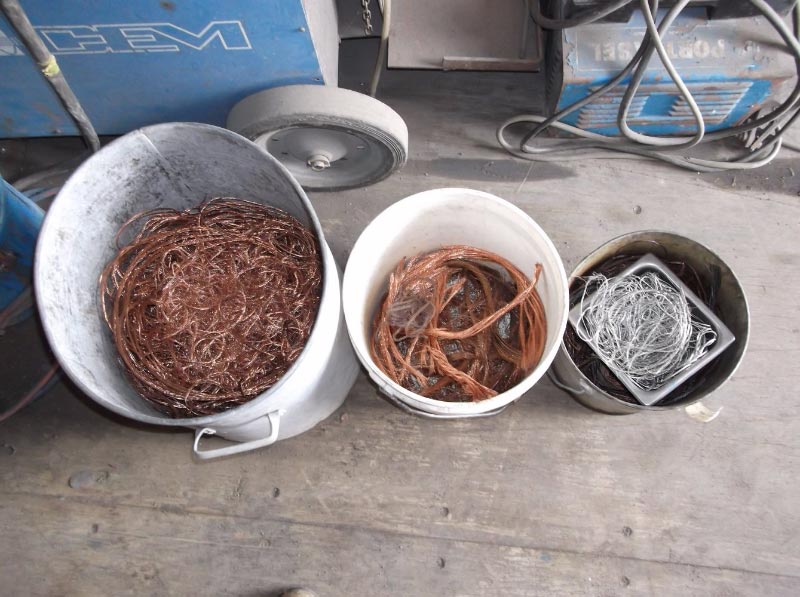 three buckets full of twine