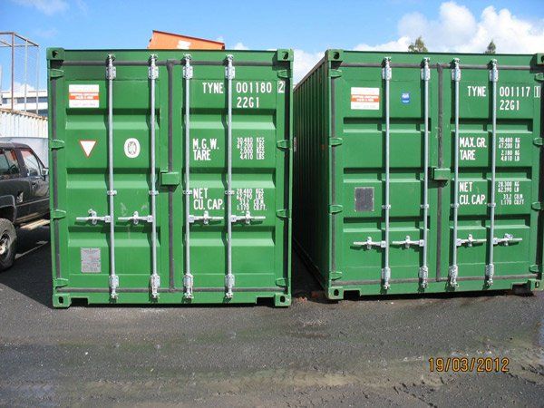 green containers side by side