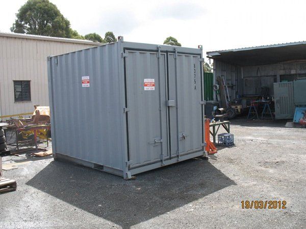 smaller grey container