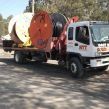 flat bed loaded with large spools