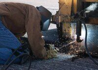 welder fusing an attachment