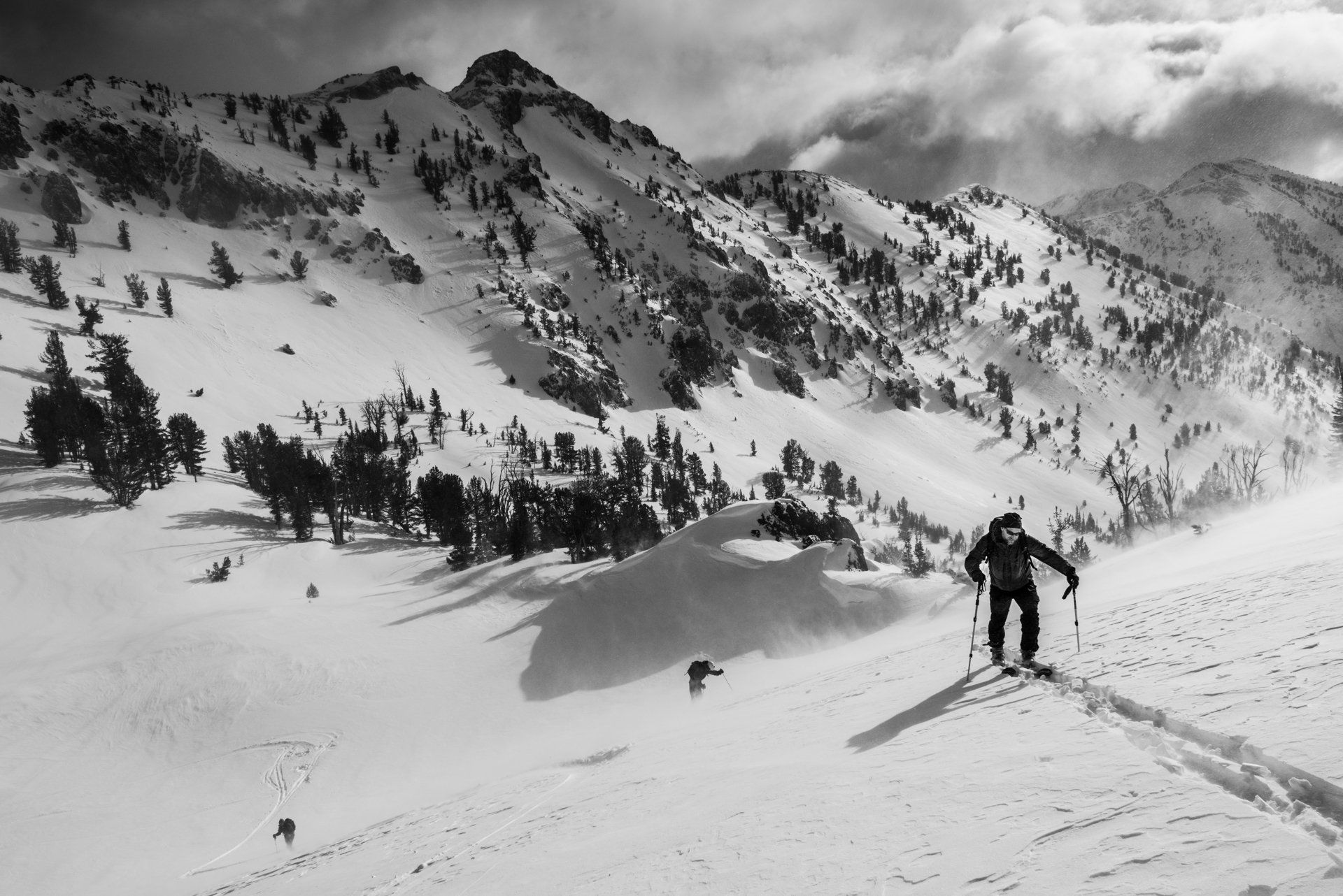 Backcountry skiing setting a skin track