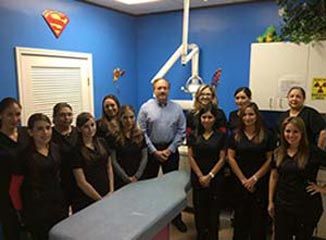 Dr. Bill D. pope Jr. And His Staffs In Other Angle — Pediatric Dental Care In Mcallen, TX Dr. Bill D. pope Jr. And His Staffs In Other Angle — Pediatric Dental Care In Mcallen, TX