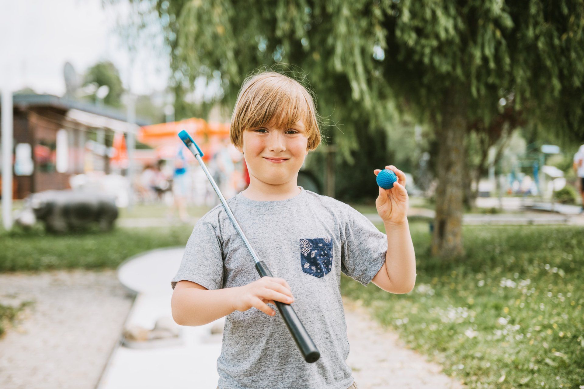 boy playing golf