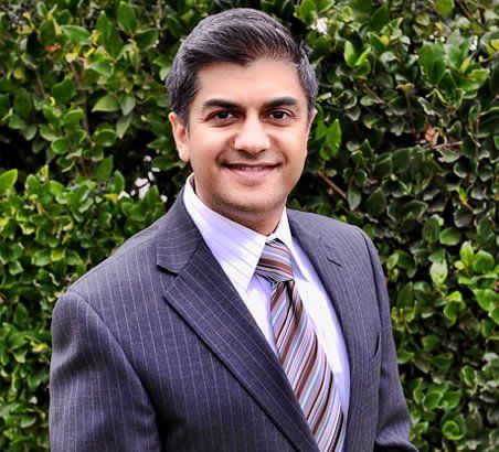 Amitabh U. Goswami Smiling Client