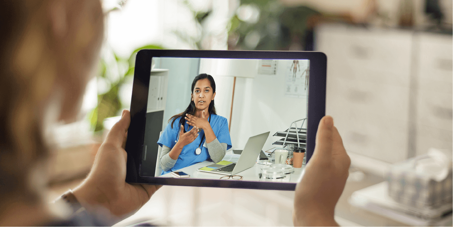 Patient calling doctor on Ipad and talking to her through a Televisit