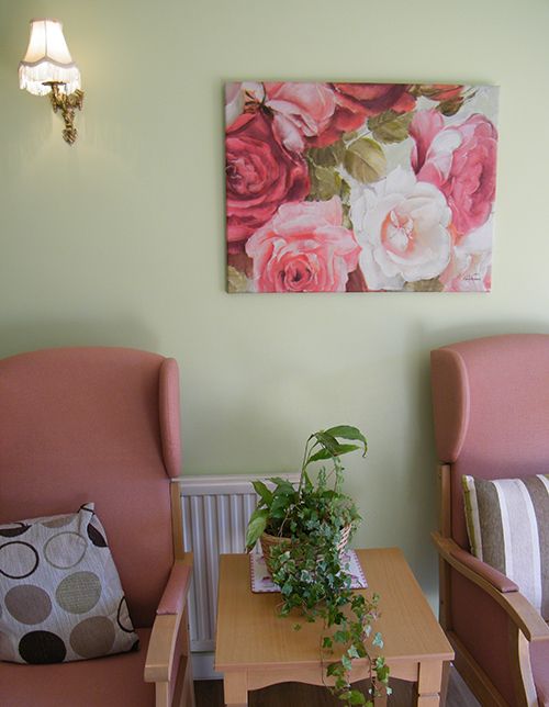 Wall mounted painting of flowers