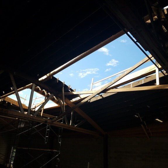 Sky through a building's roof with a dual skylight system, skylight repair by an Expert in Chicago
