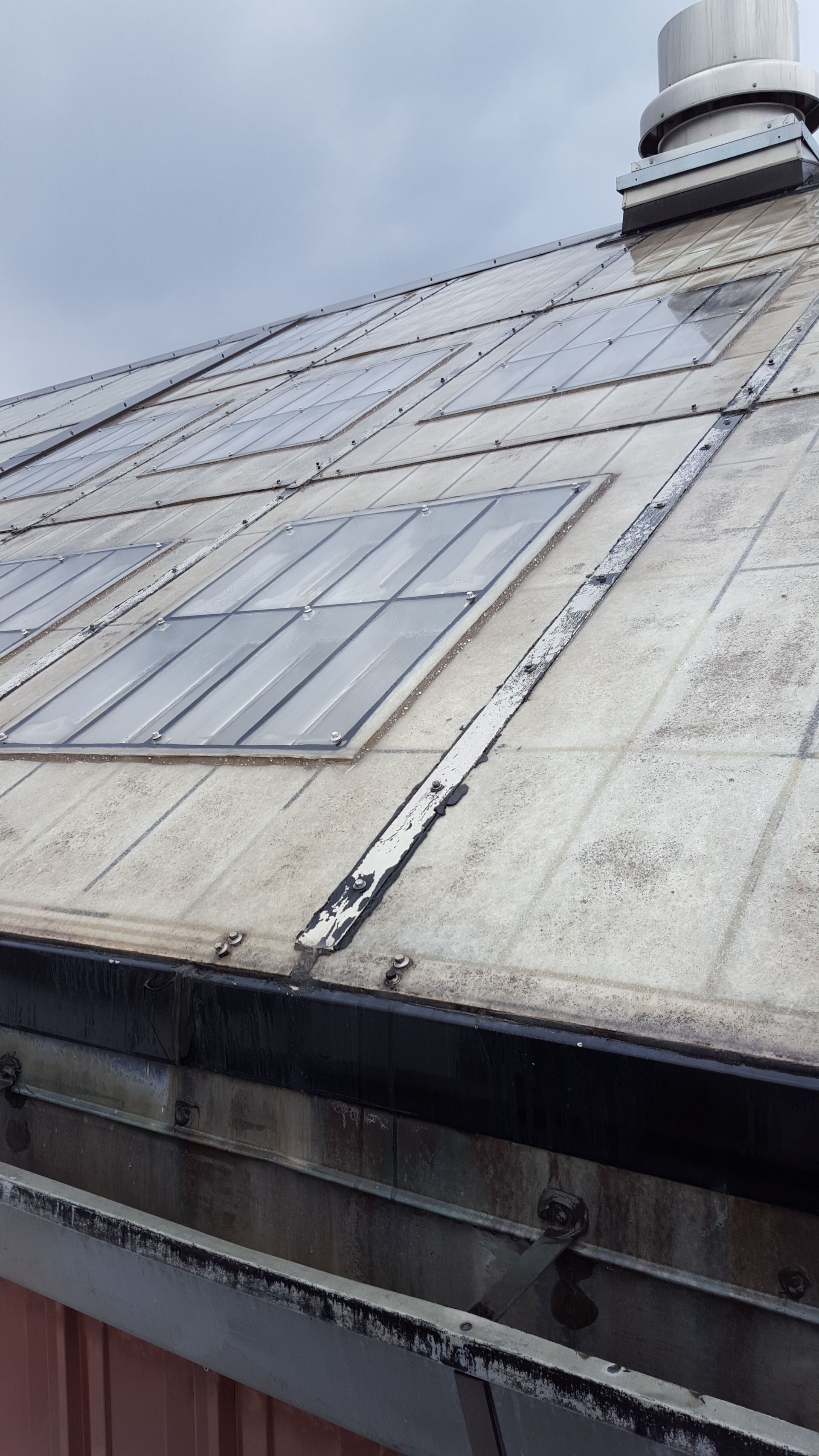 A roof with a lot of solar panels on it