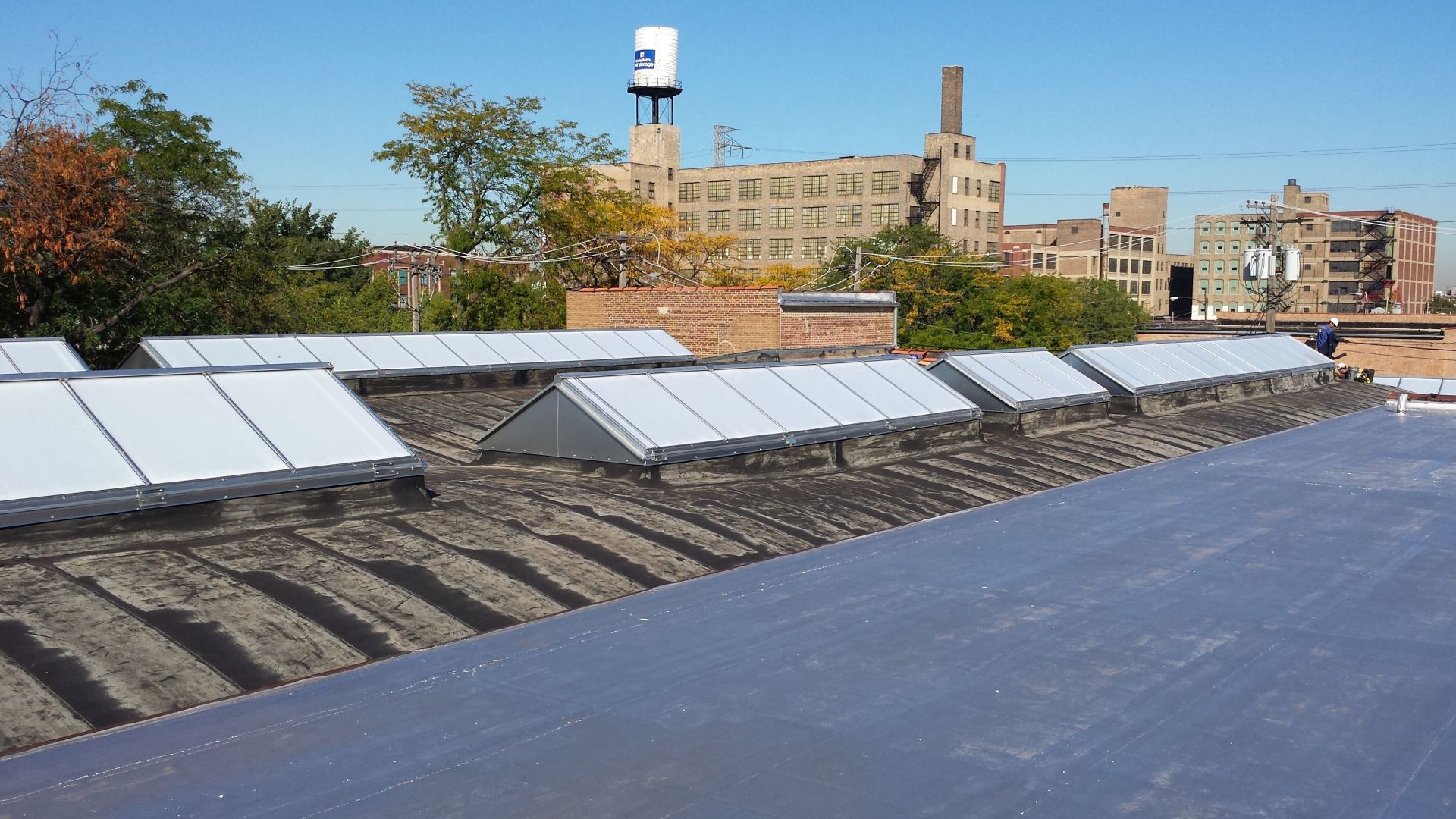 A roof with a lot of solar panels on it