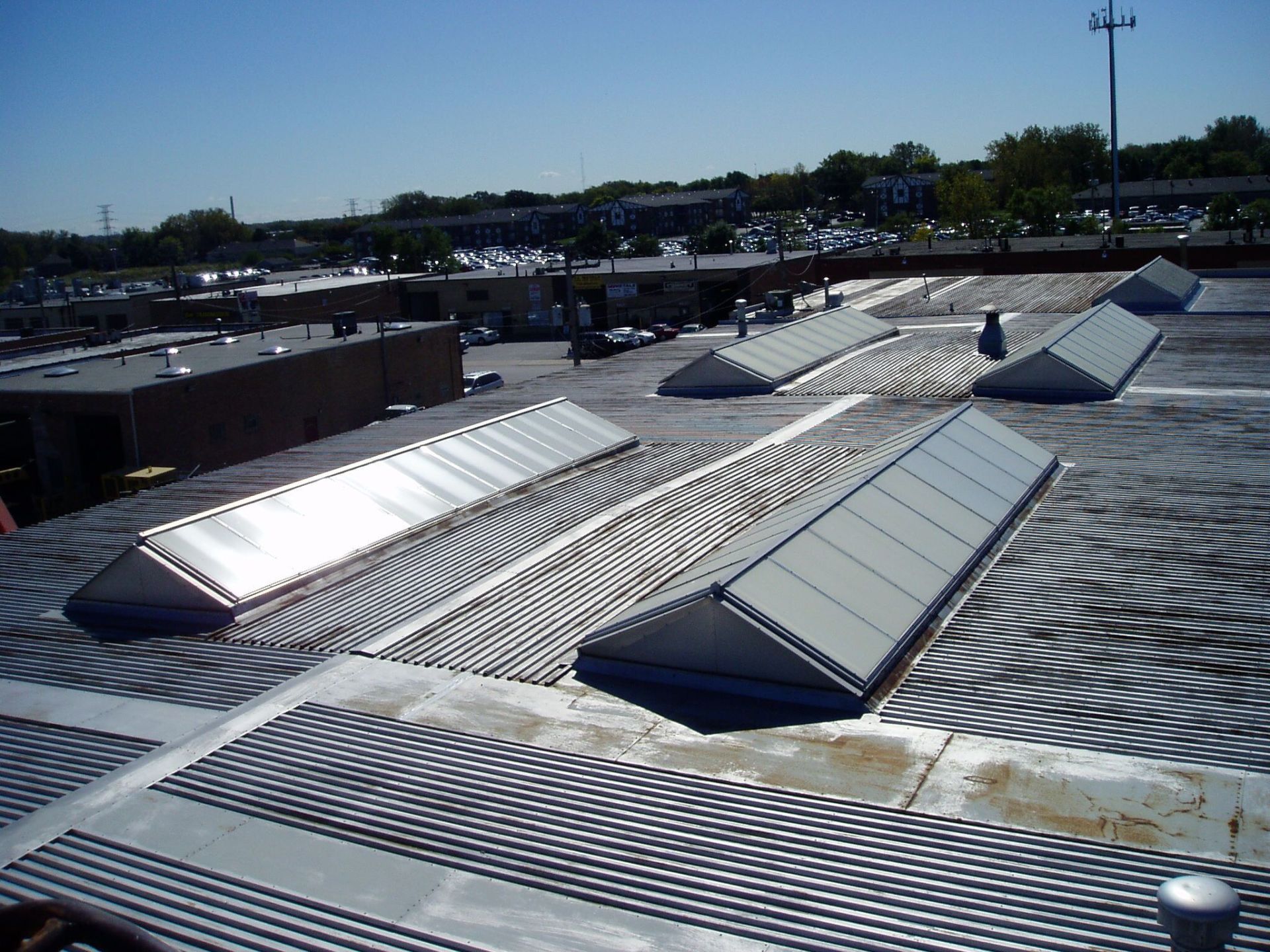A roof with a lot of skylights on it