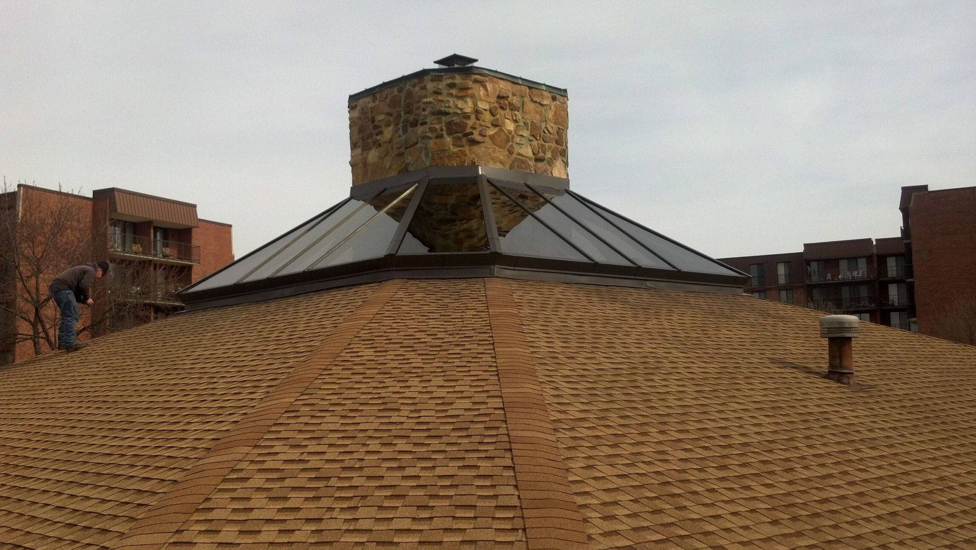 A brick building with a chimney on top of it