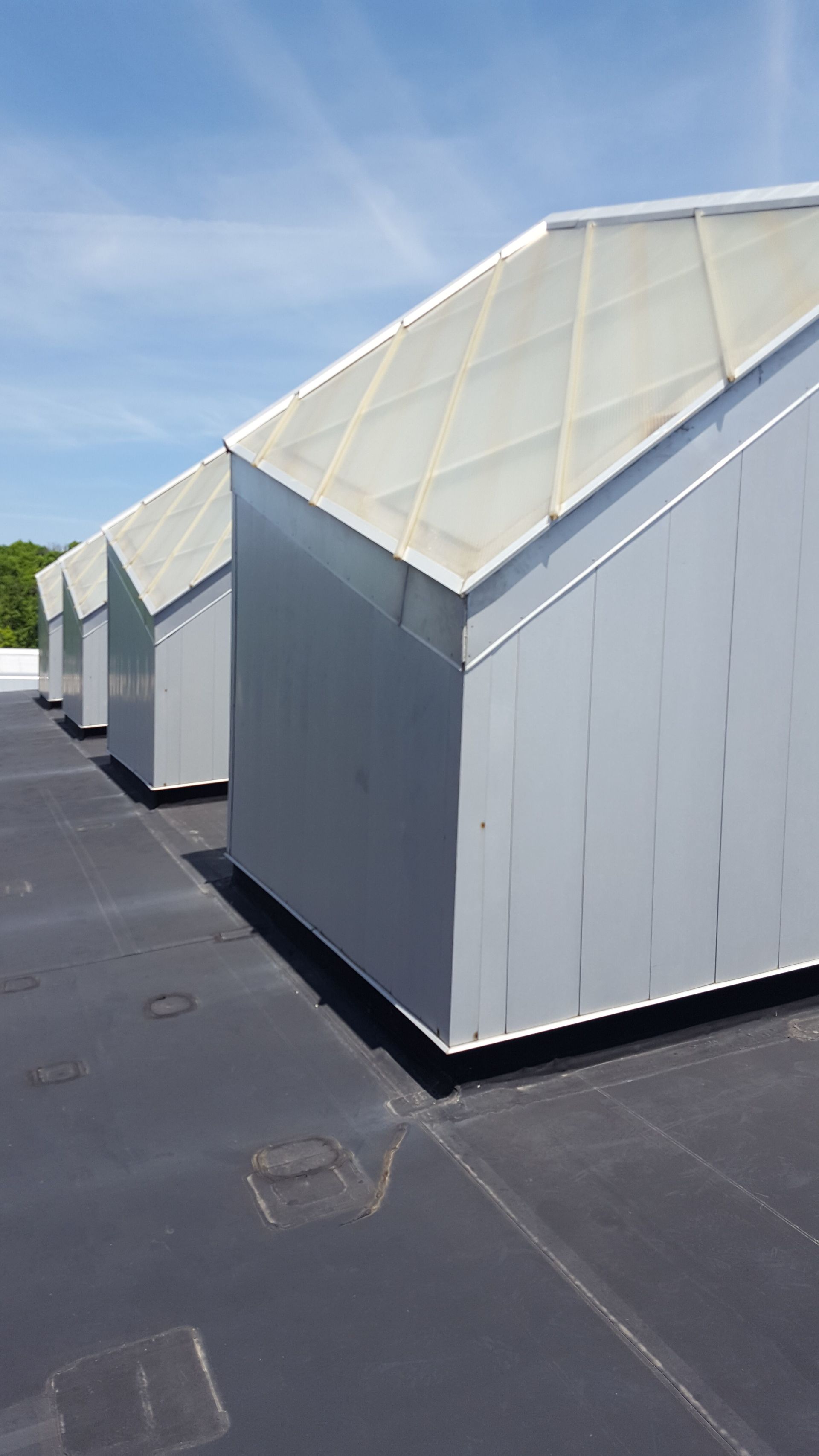 A row of buildings sitting on top of a roof.