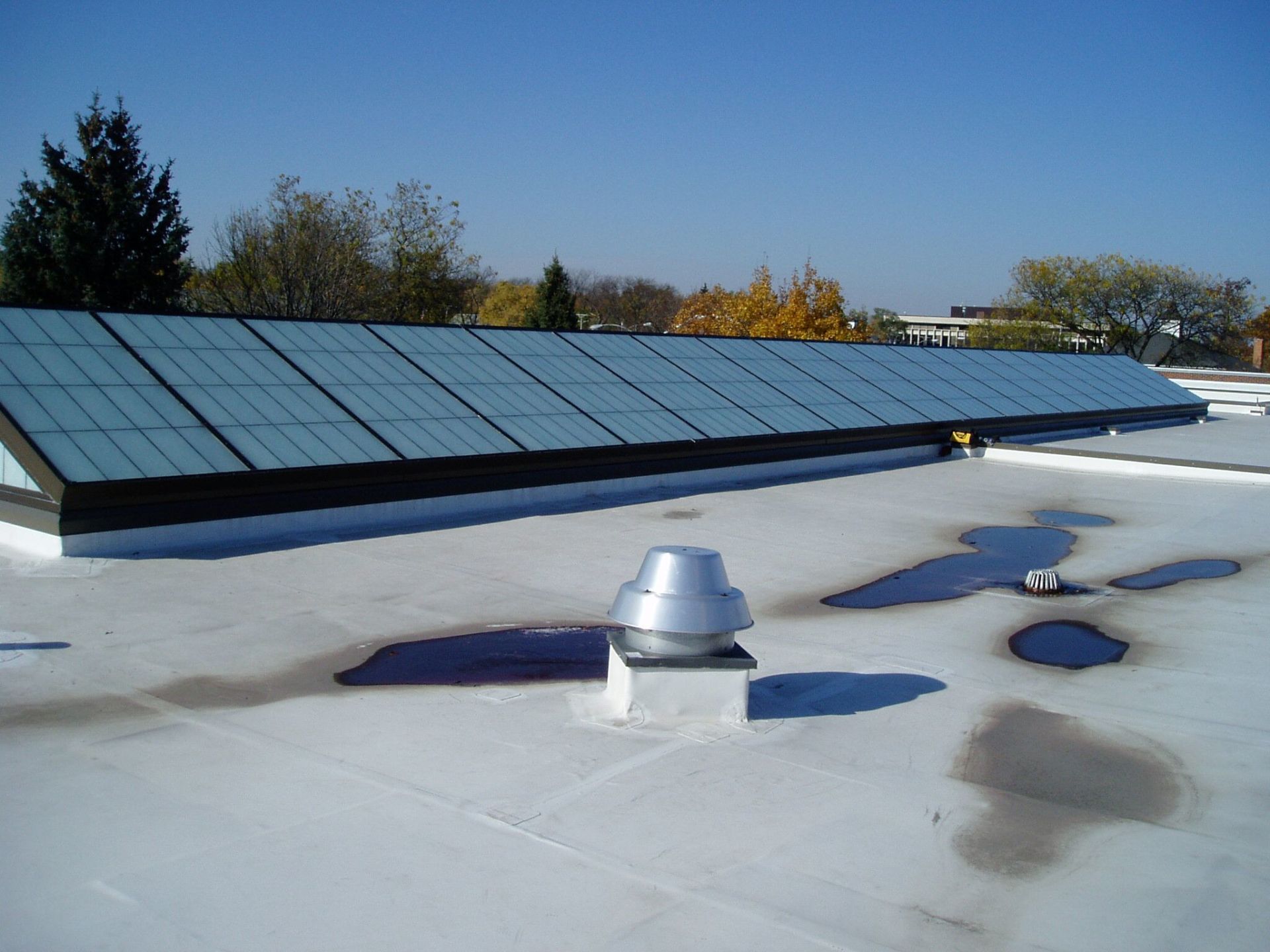 A roof with a lot of solar panels on it