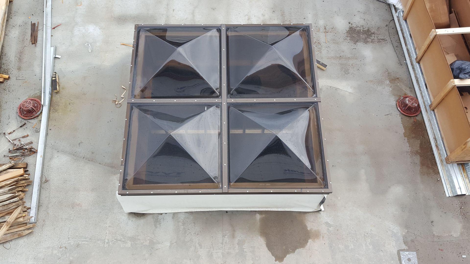 An aerial view of a skylight on the roof of a building