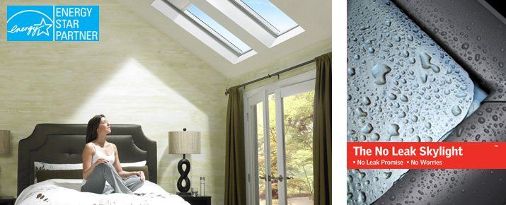 A woman is sitting on a bed next to a picture of a skylight.