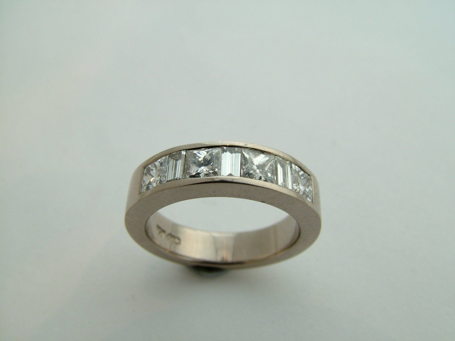 Princess cut and Baguette cut diamond band. 1/2 band.