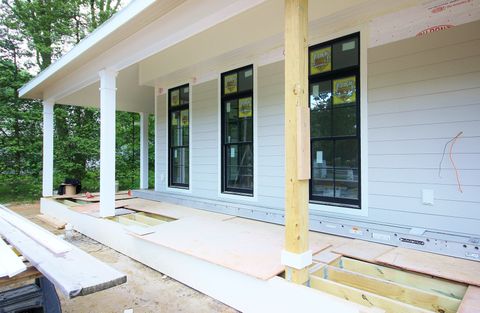Windows — Wooden Sliding Door in the Room in Oaklyn, NJ Windows — Wooden Sliding Door in the Room in Oaklyn, NJ