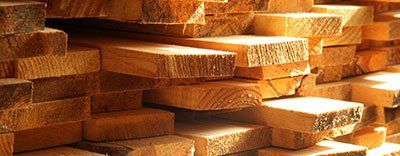 Treated Lumber — Applying Protective Varnish on a Wooden Texture, Diy and Repair House Equipment Concept in Oaklyn, NJ Treated Lumber — Applying Protective Varnish on a Wooden Texture, Diy and Repair House Equipment Concept in Oaklyn, NJ