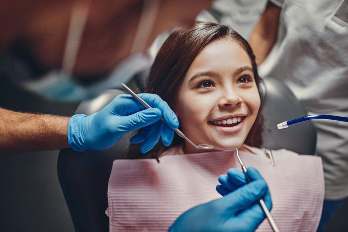 Little Girl Taking Dental Checkup — Bloomingdale, IL — Dr Boyer & Scheive, DDS