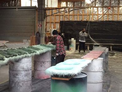 Professionals of G J H Fibreglass Limited working with fibreglass
